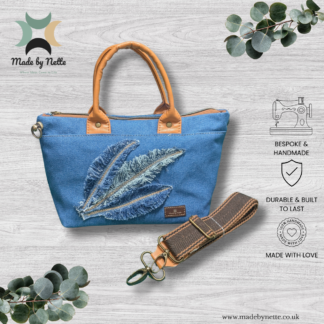 Spirit handmade denim tote bag with three frayed denim feathers