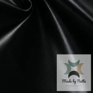 Smooth black faux leather for a classic colour with added surface interest.