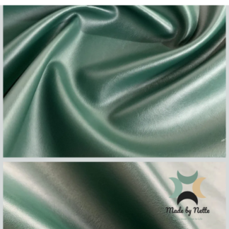 Smooth dark green faux leather for rich, understated bag designs.