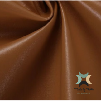 Smooth old tan brown faux leather for warm, traditional-inspired bag designs.