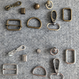 A selection of bag-making hardware in antique brass and silver finishes, used to add practical function and a coordinated finish to suitable Made by Nette bag designs.