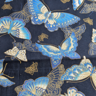 A patterned cotton fabric combining shades of blue with cream and gold detailing for an elegant, decorative finish.