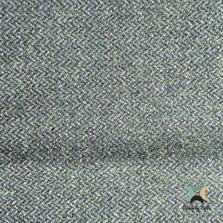 A textured Orkney Tweed Style fabric featuring a rich blend of blue and green tones.