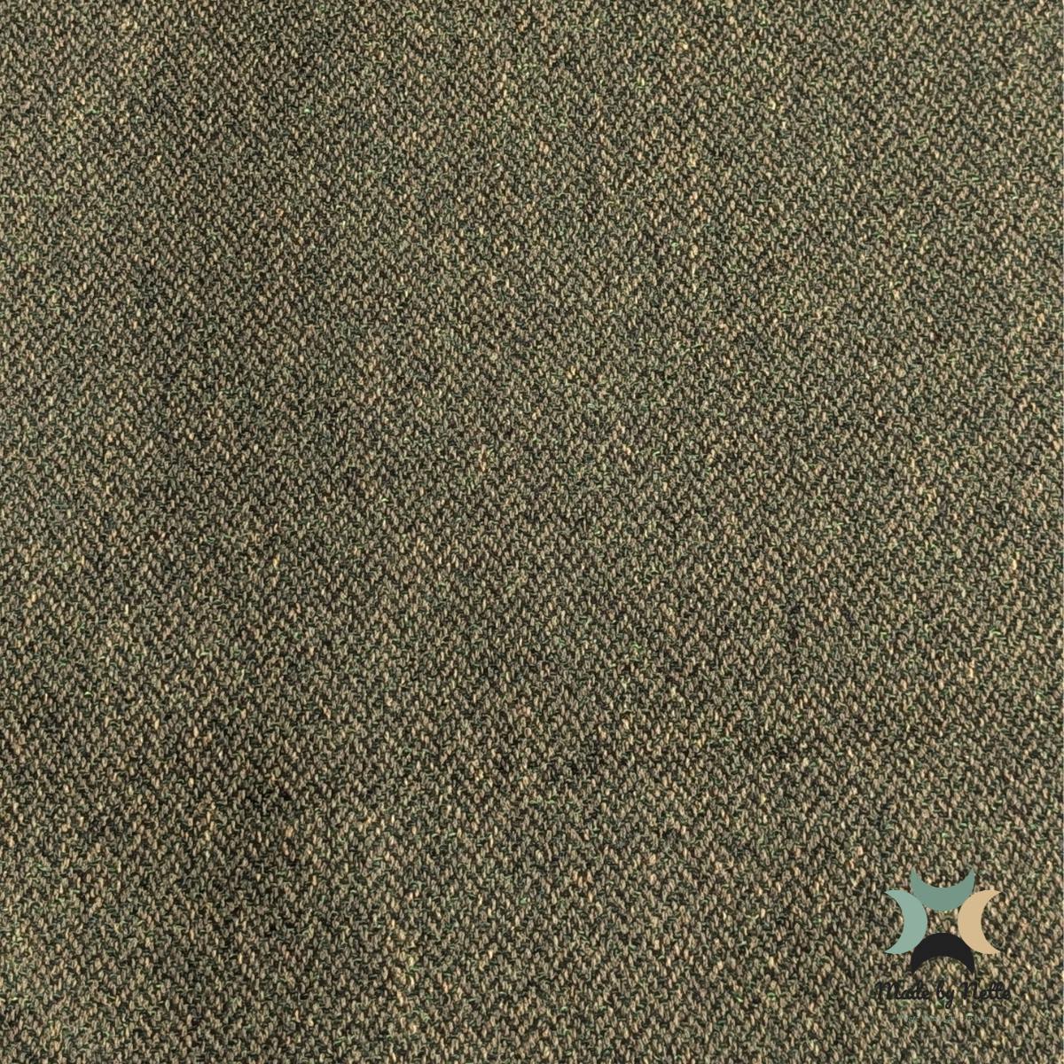 A textured Orkney Tweed Style fabric in deep forest-green and earthy mixed tones.