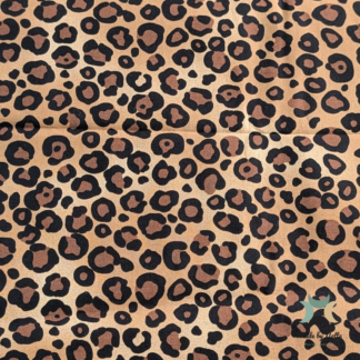 A patterned cotton fabric featuring a leopard print for a bold, eye-catching finish.
