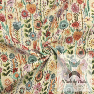 Kew Gardens tapestry fabric featuring a colourful botanical-inspired design on a light background.