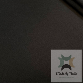 Black waterproof canvas, a classic and versatile option for handmade bag designs.