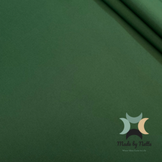Green water-resistant upholstery fabric offering a versatile colour for handmade bags.